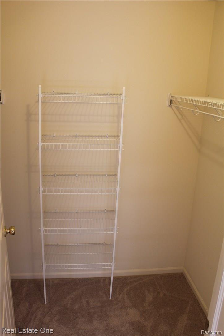 3512 Tremonte Cir Circle South, Unit 293 Rochester, MI 48306 - Photo 16 of 28 Large walk in closet in 2nd bedroom
