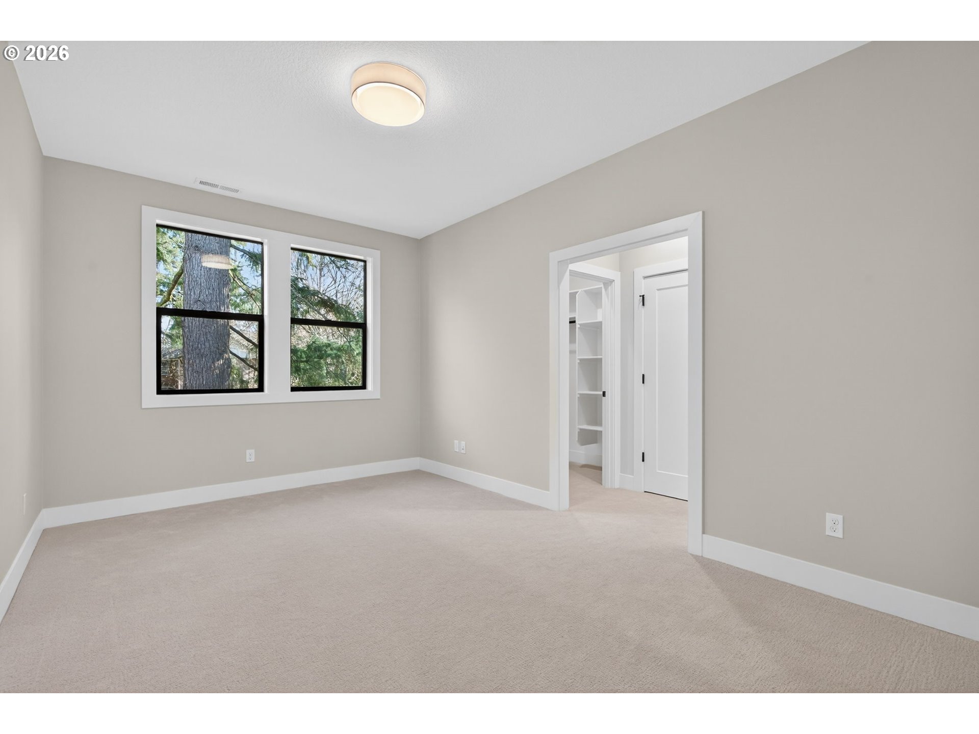 7705 Southwest Alden Street Portland, OR 97223 - Photo 13 of 30 a view of an empty room with a window