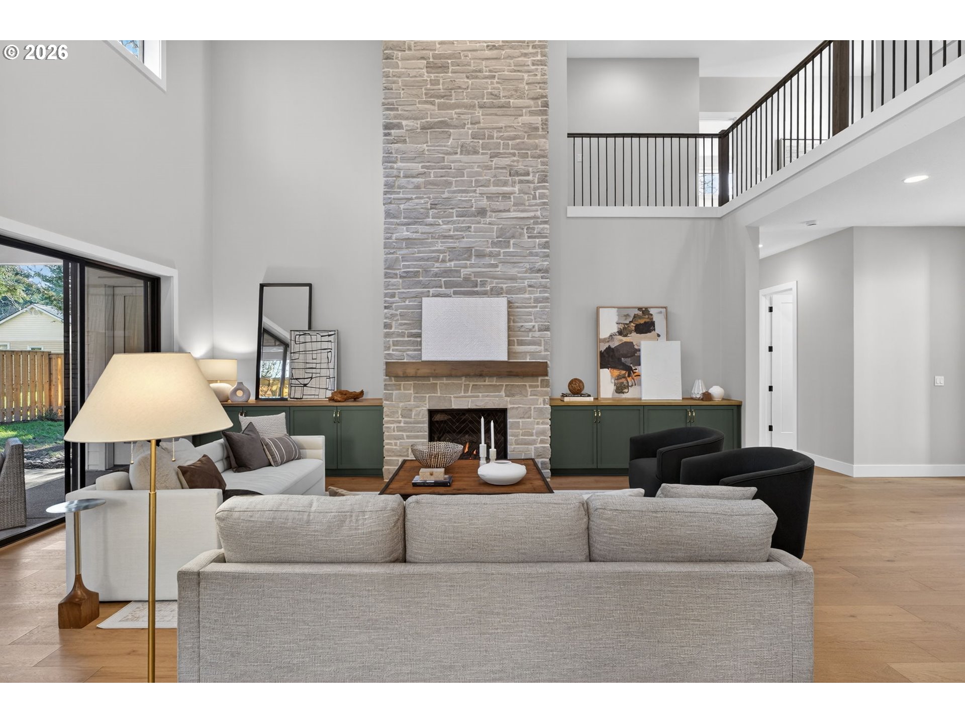 7705 Southwest Alden Street Portland, OR 97223 - Photo 15 of 30 a living room with furniture and a fireplace