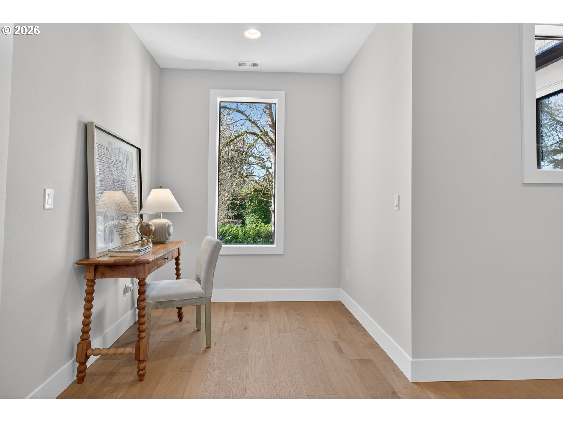 7705 Southwest Alden Street Portland, OR 97223 - Photo 16 of 30 a living room with furniture and a window