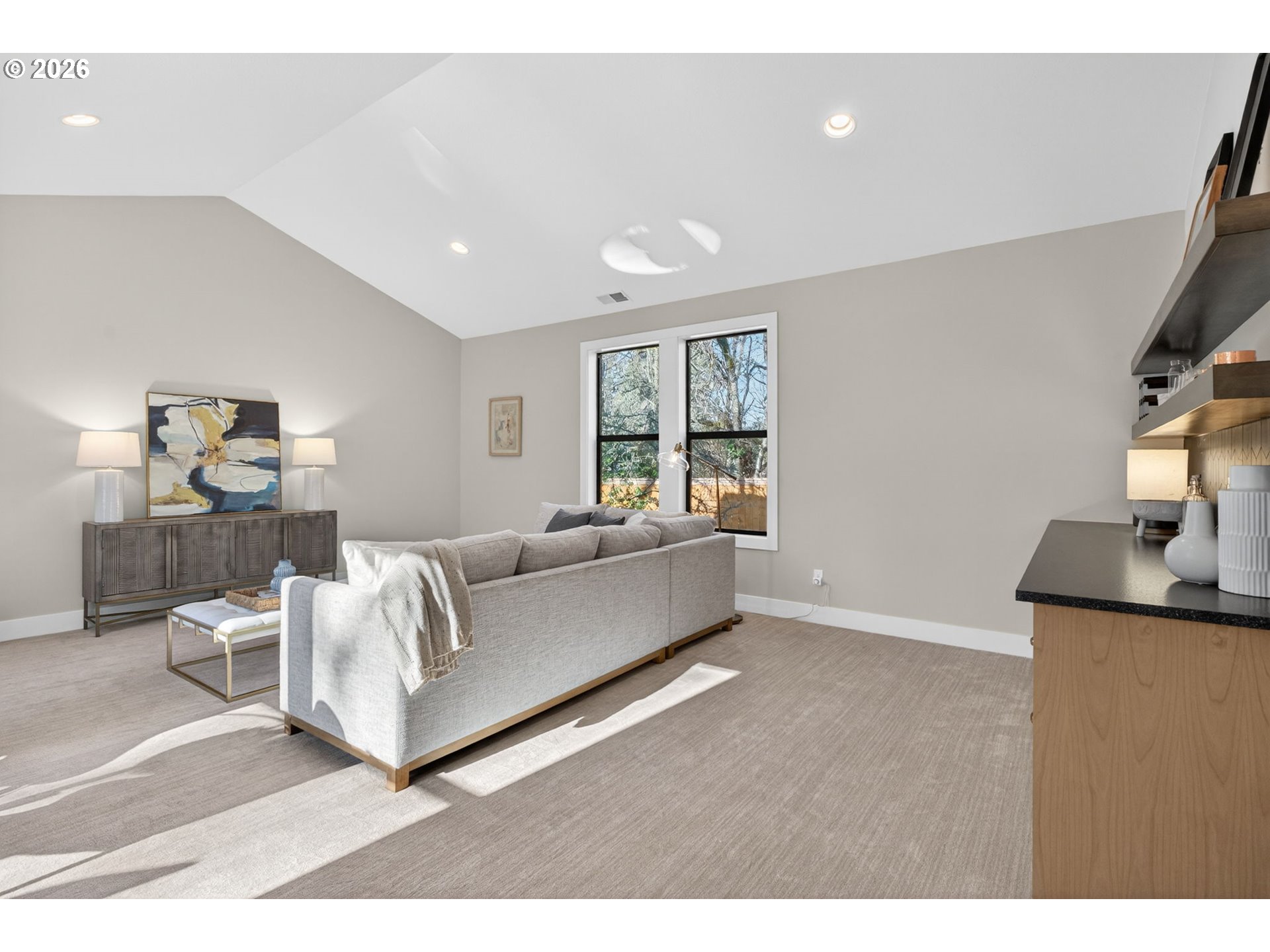 7705 Southwest Alden Street Portland, OR 97223 - Photo 20 of 30 a living room with furniture and a flat screen tv