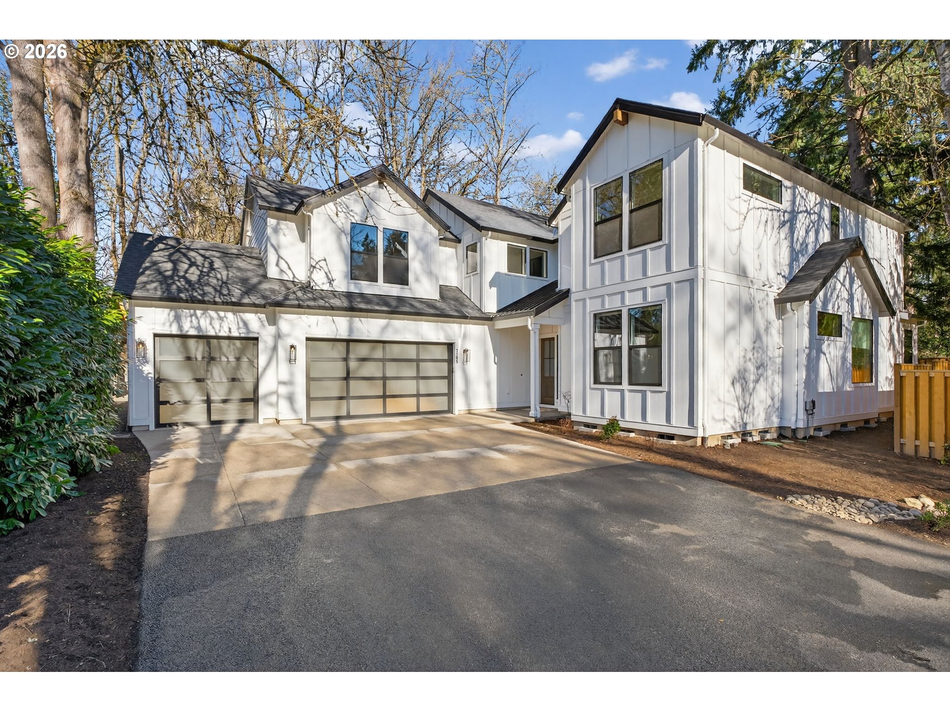 7705 Southwest Alden Street Portland, OR 97223 - Photo 25 of 30 a front view of a house with a yard