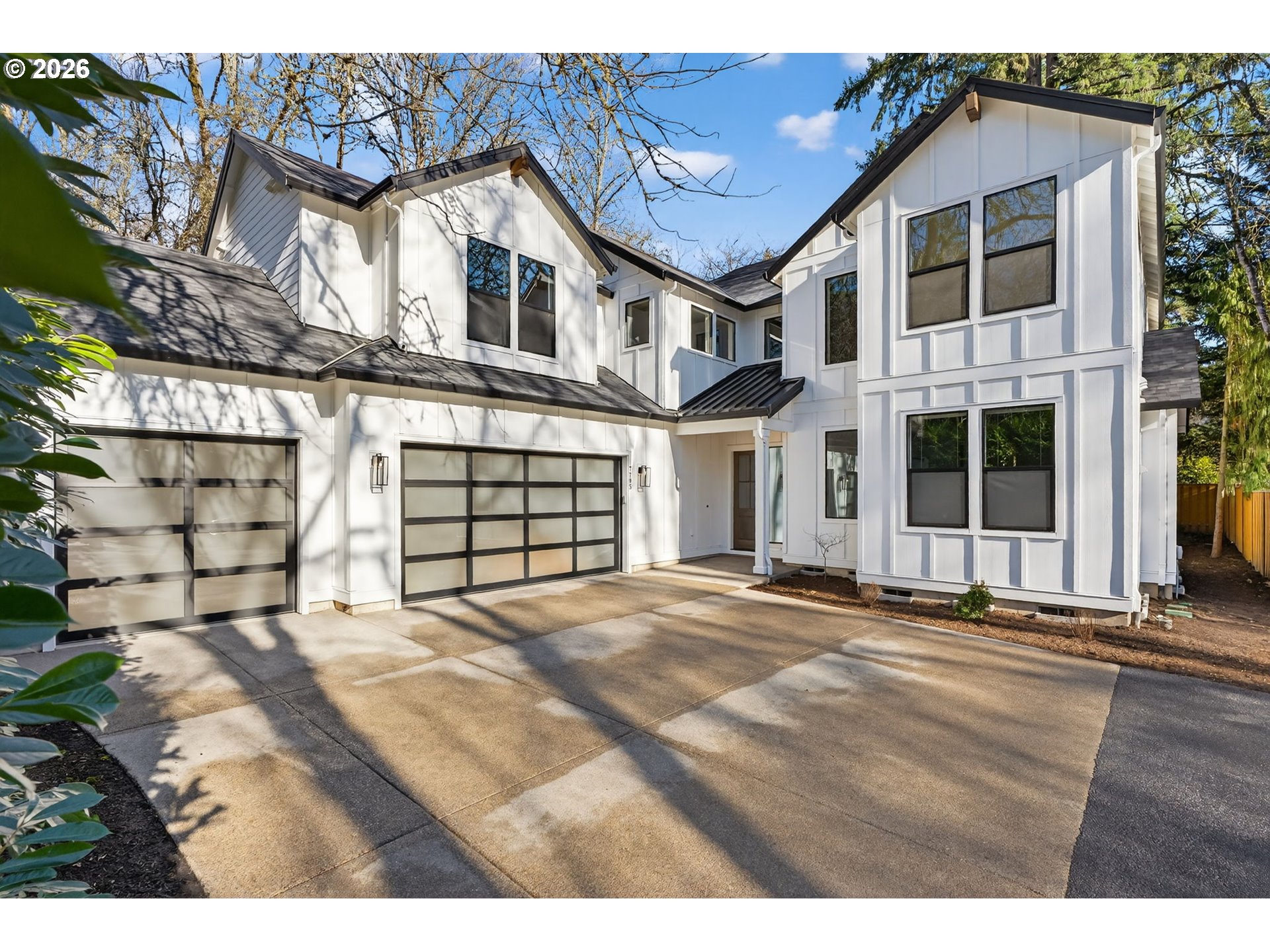 7705 Southwest Alden Street Portland, OR 97223 - Photo 28 of 30 a front view of a house with a yard