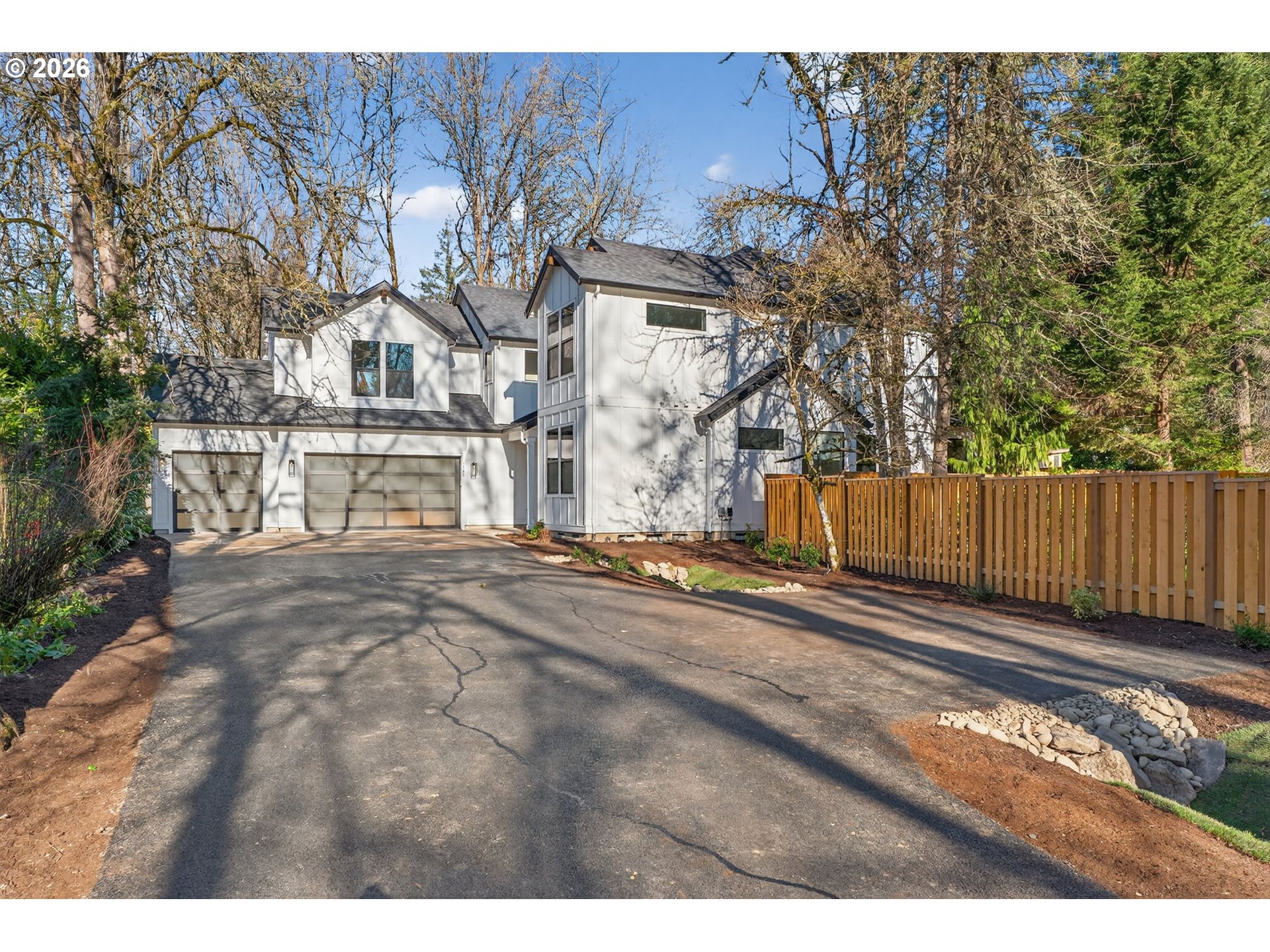 7705 Southwest Alden Street Portland, OR 97223 - Photo 30 of 30 a view of a yard with wooden fence