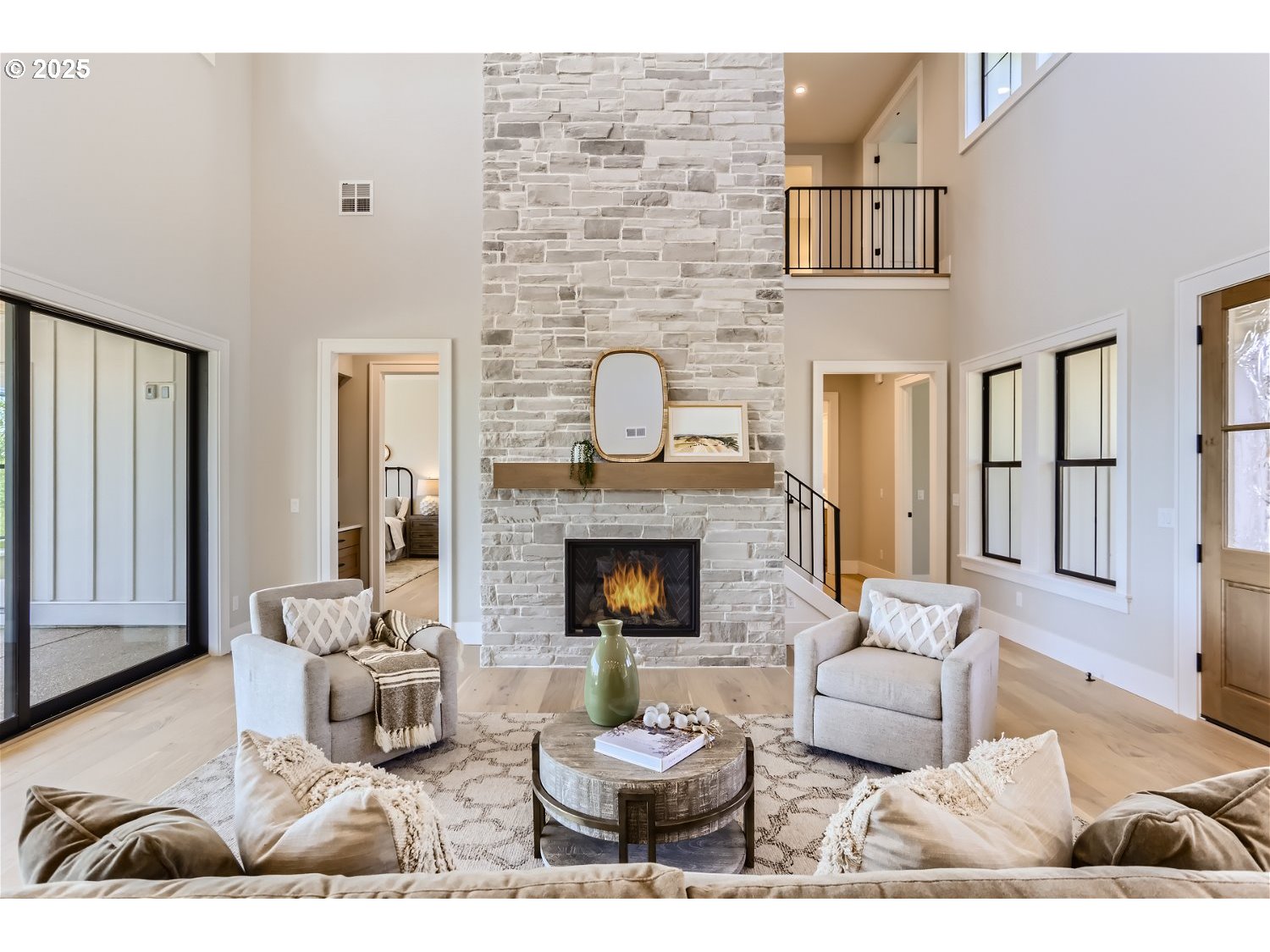 7705 Southwest Alden Street Portland, OR 97223 - Photo 4 of 30 a living room with furniture and a fireplace