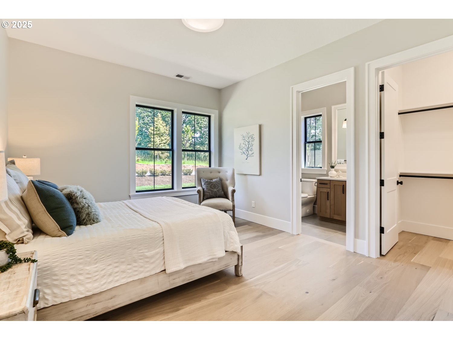 7705 Southwest Alden Street Portland, OR 97223 - Photo 6 of 30 a bedroom with a bed and a window