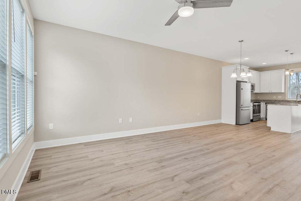 2305 Hill Street Raleigh, NC 27604 - Photo 20 of 26 a view of a kitchen with a sink and a window