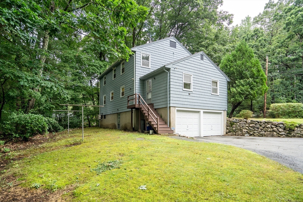 32 Dewey Road Lexington, MA 02420 - Photo 32 of 32 a view of house with backyard and entertaining space