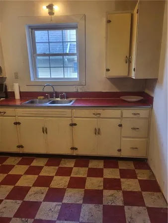 a close view of a black and white checkered floor