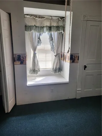 a view of walk in closet with window