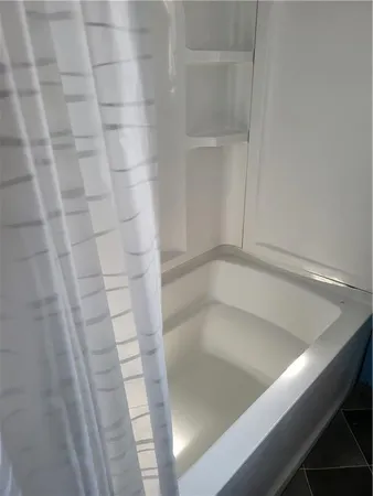 a bathroom with a bathtub