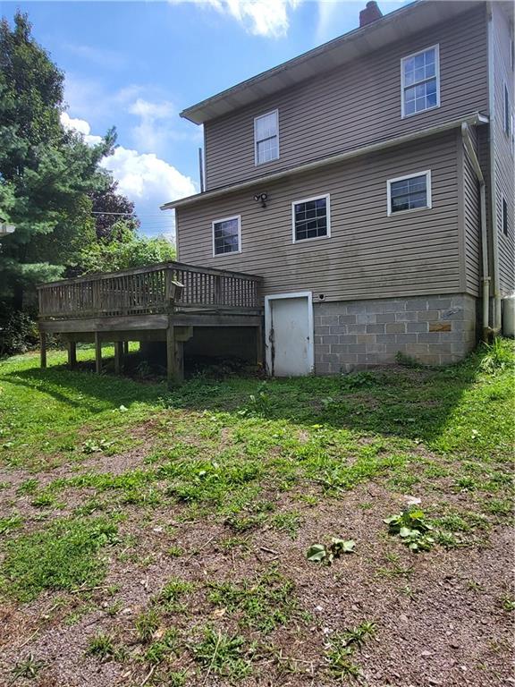 734 Main Street Addison, PA 15411 - Photo 21 of 27 a backyard of a house with lots of green space