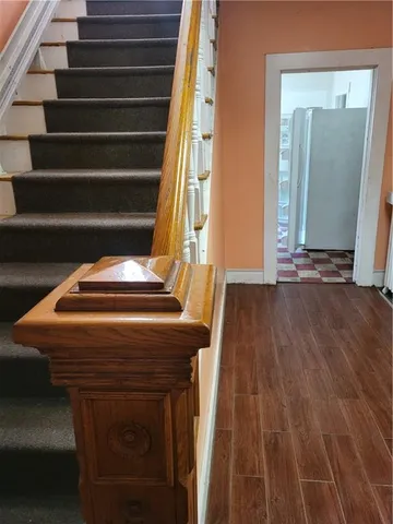 a view of entryway with wooden floor