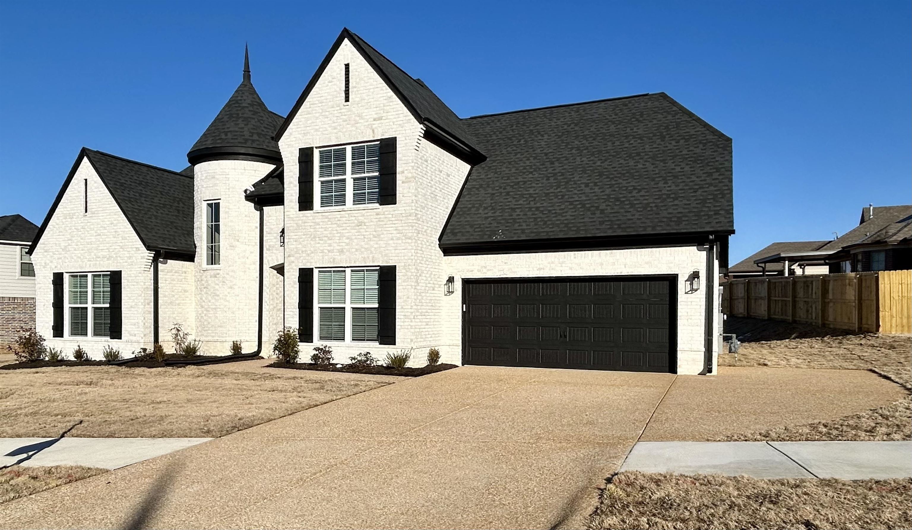 7819 Shadowcrest Road Memphis, TN 38125 - Photo 2 of 4 View of front of property with a garage