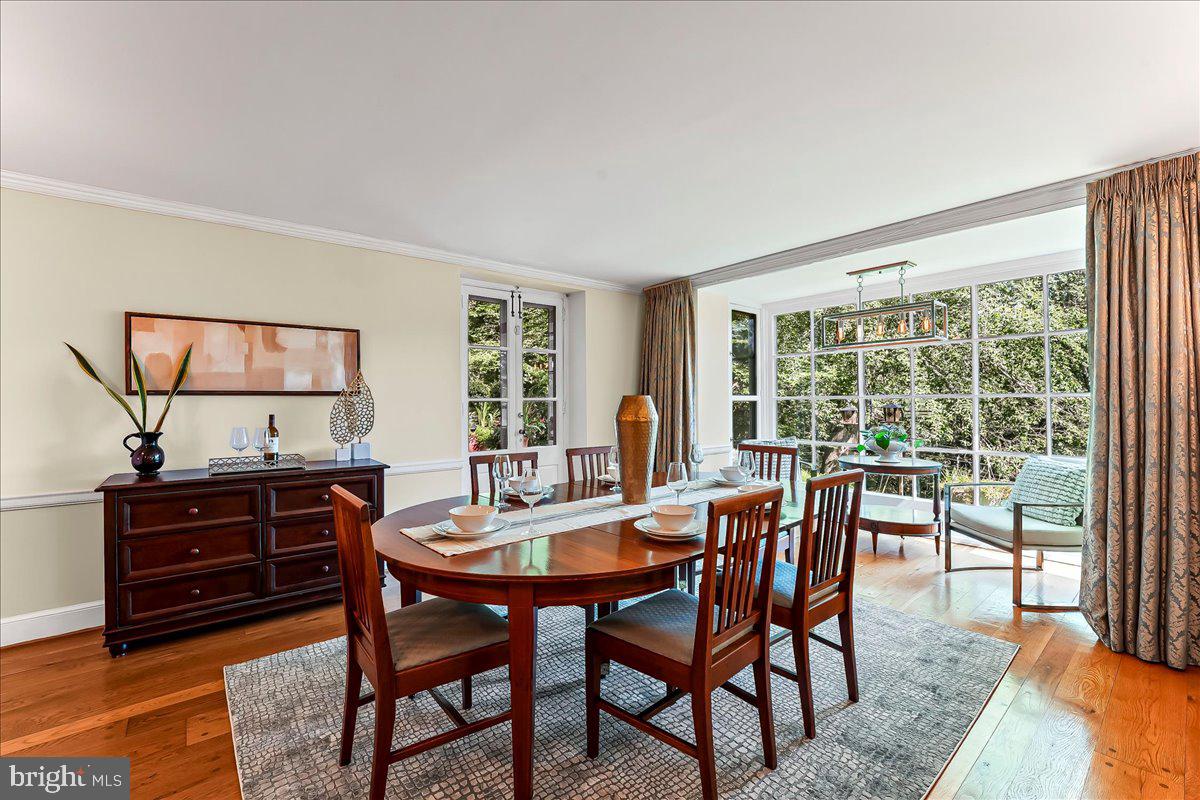 716 Old Gulph Road Bryn Mawr, PA 19010 - Photo 11 of 58 a view of a dining room with furniture window and outside view