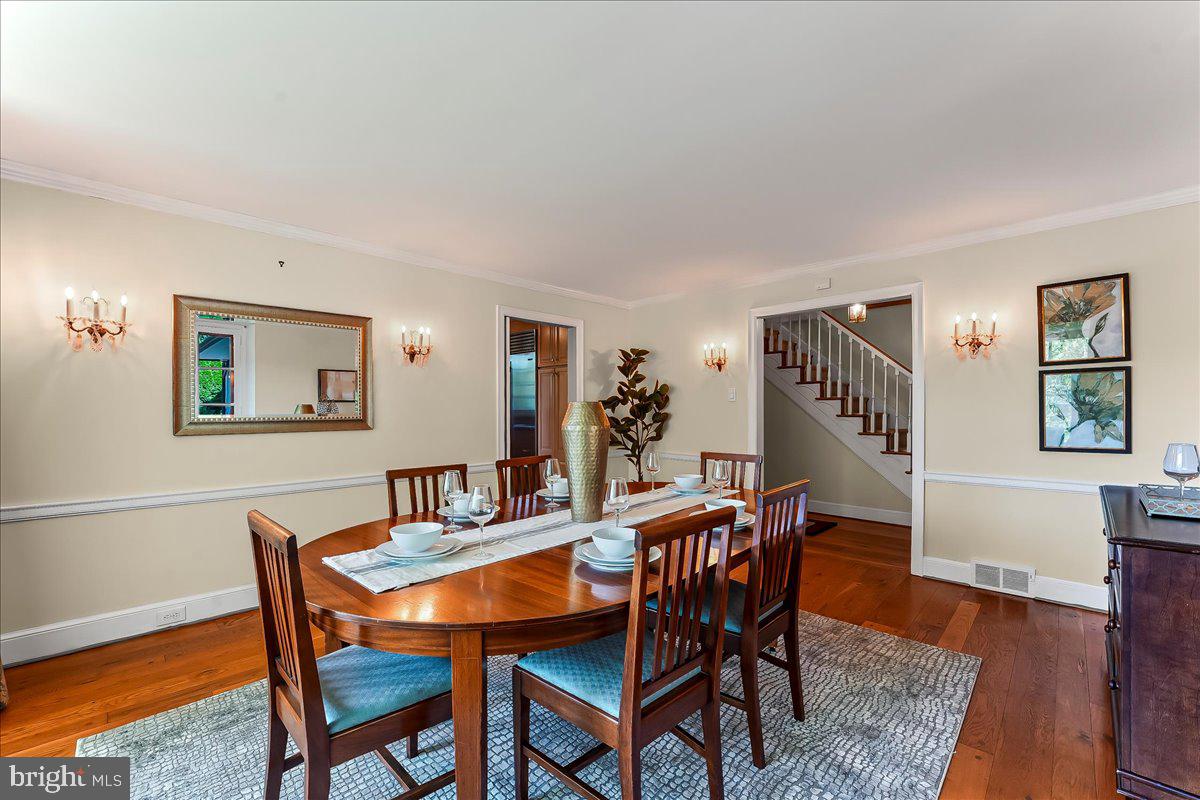 716 Old Gulph Road Bryn Mawr, PA 19010 - Photo 12 of 58 a dining room with furniture and wooden floor