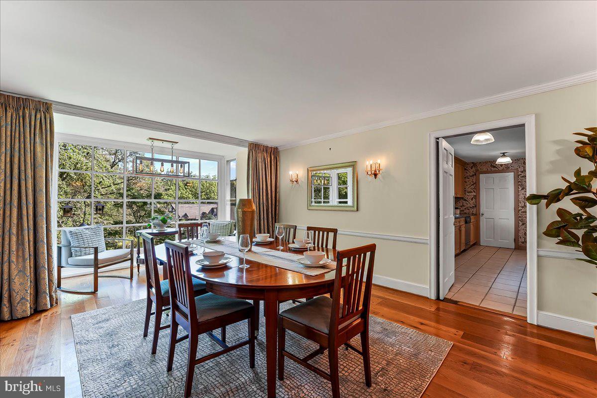 716 Old Gulph Road Bryn Mawr, PA 19010 - Photo 13 of 58 a view of a dining room with furniture window and wooden floor