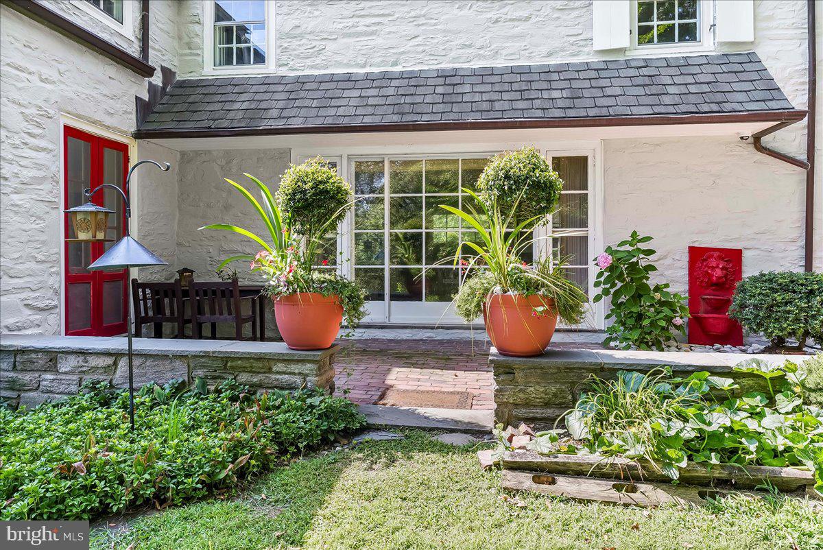 716 Old Gulph Road Bryn Mawr, PA 19010 - Photo 50 of 58 a front view of a house with garden