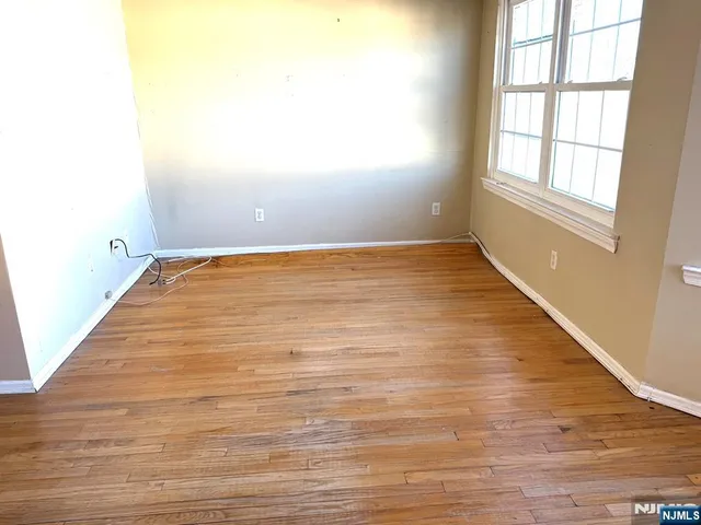 a view of a room with an empty space