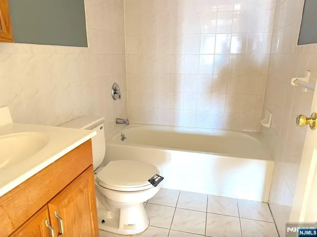 a bathroom with a sink and a bathtub
