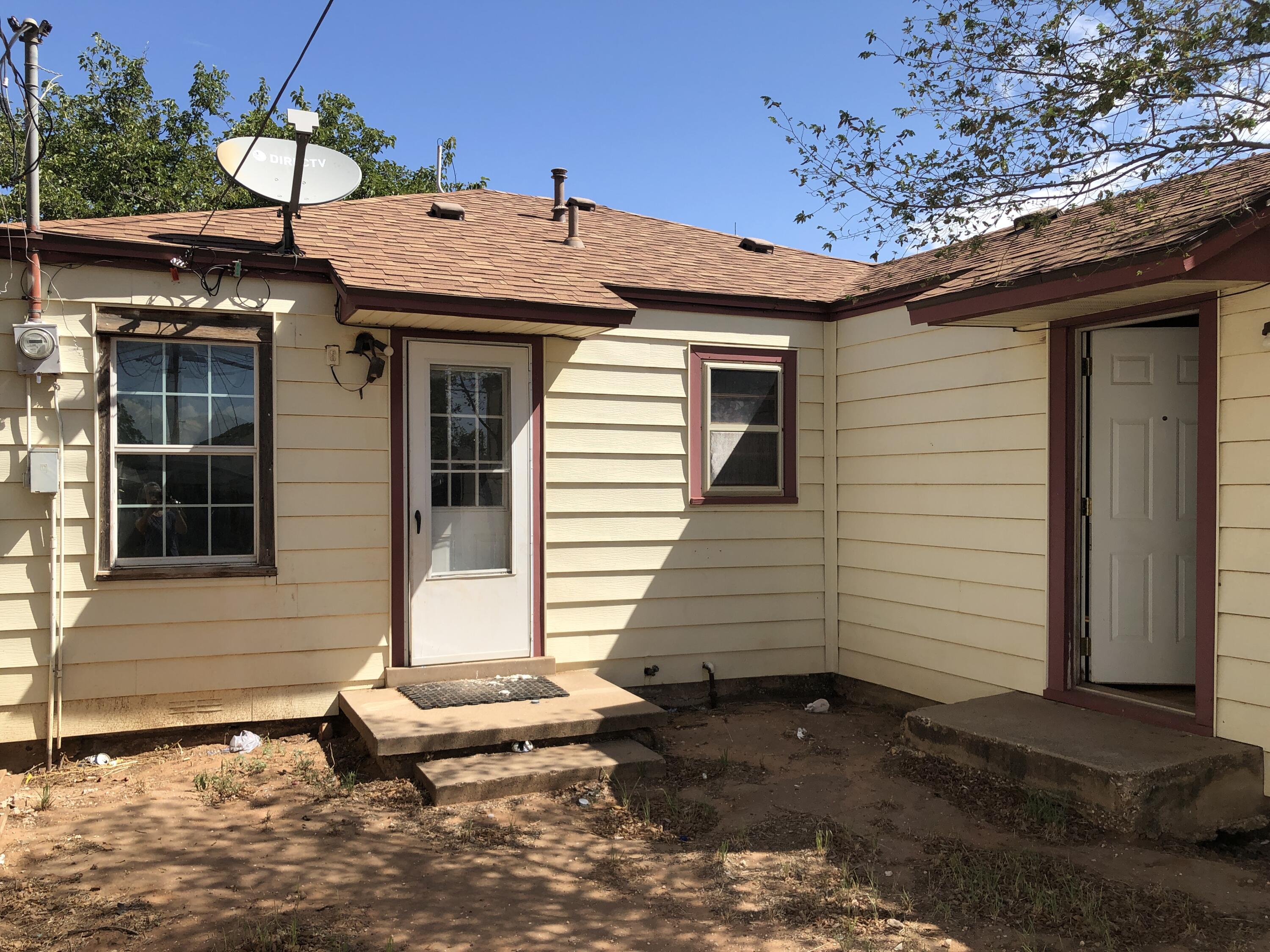 5107 40th Street Lubbock, TX 79414 - Photo 8 of 10 a front view of a house