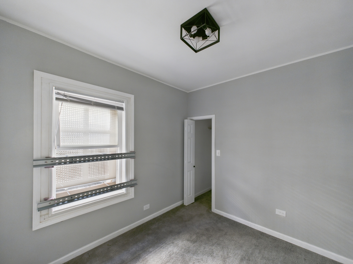 7425 South Perry Avenue Chicago, IL 60621 - Photo 10 of 16 an empty room with a door