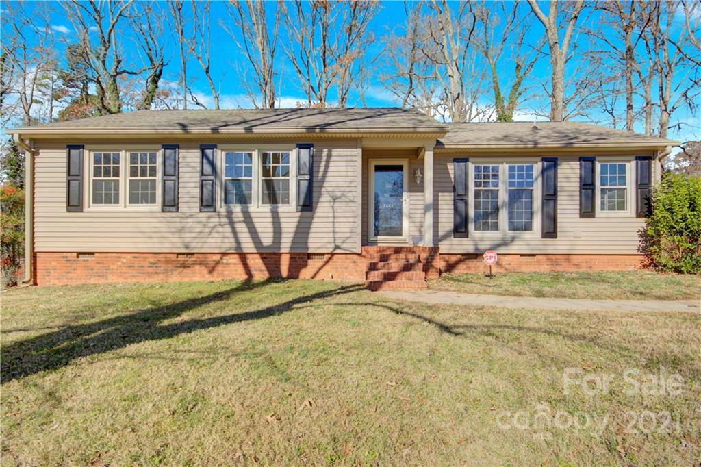 7243 Fox Hunt Road Charlotte, NC 28212 - Photo 1 of 34 a view of a house with a backyard and sitting area