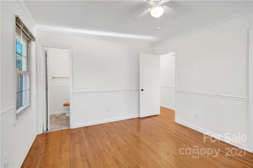 7243 Fox Hunt Road Charlotte, NC 28212 - Photo 12 of 34 a view of empty room with wooden floor
