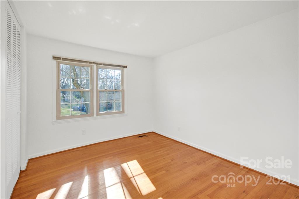 7243 Fox Hunt Road Charlotte, NC 28212 - Photo 14 of 34 a view of an empty room with a window