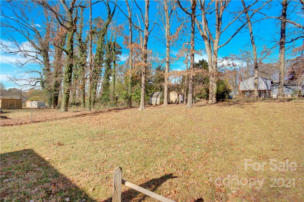 7243 Fox Hunt Road Charlotte, NC 28212 - Photo 27 of 34 a view of road with a building