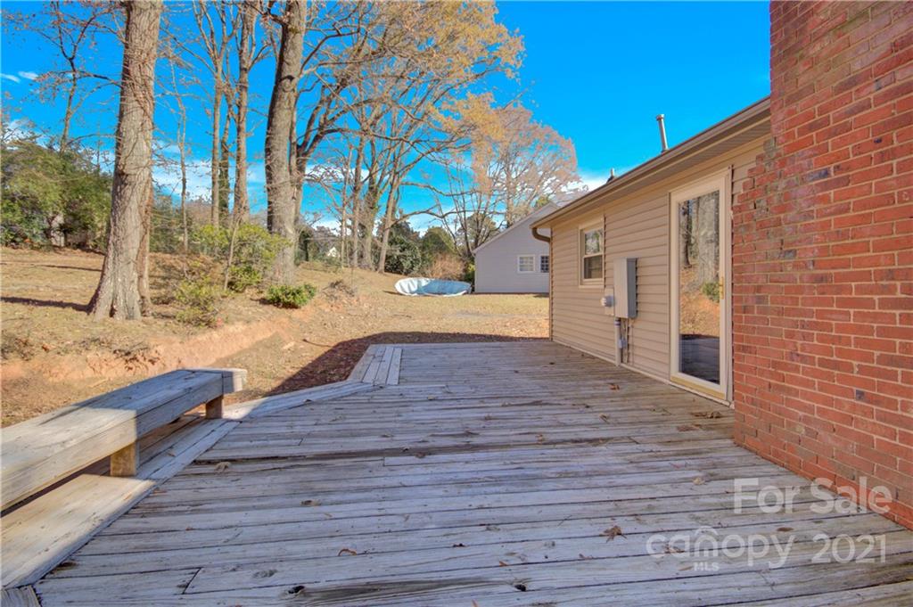 7243 Fox Hunt Road Charlotte, NC 28212 - Photo 30 of 34 a view of a house with a yard