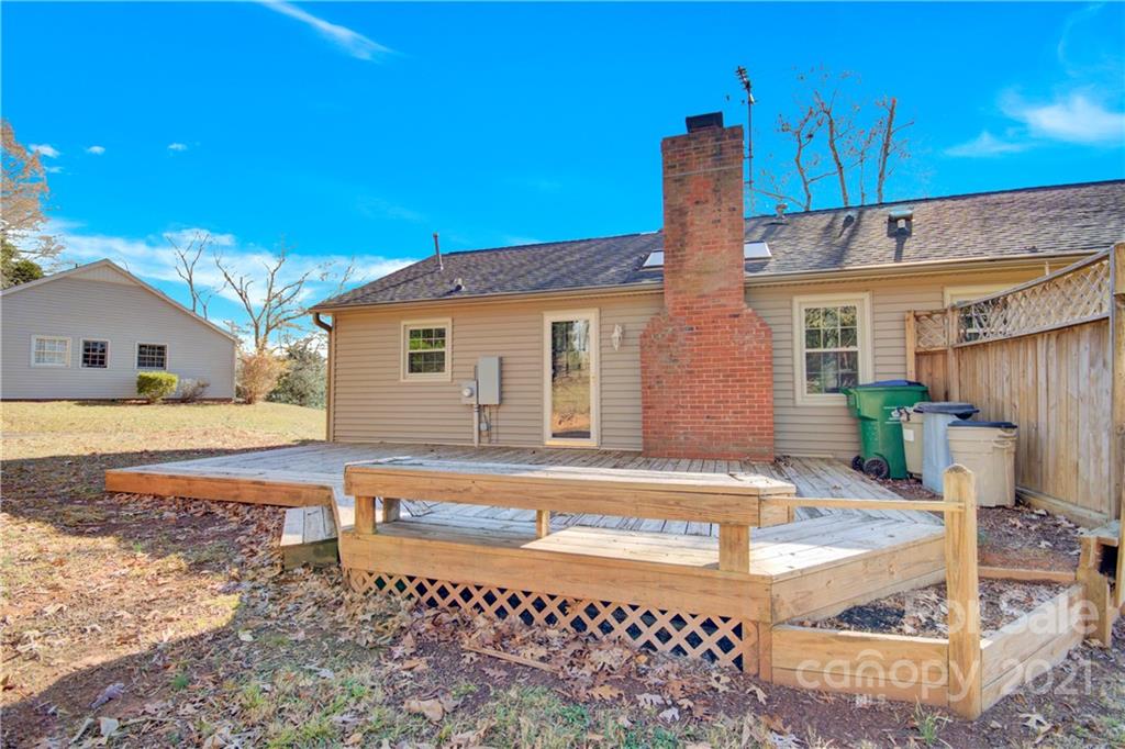 7243 Fox Hunt Road Charlotte, NC 28212 - Photo 31 of 34 a view of a house with backyard and sitting area
