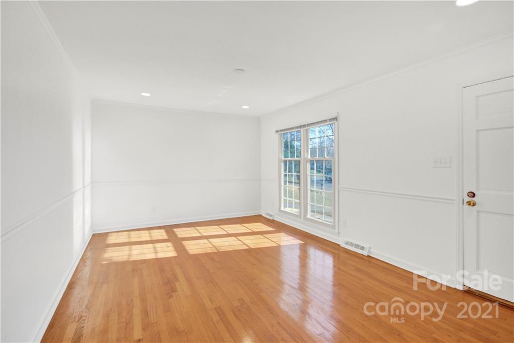 7243 Fox Hunt Road Charlotte, NC 28212 - Photo 7 of 34 a view of an empty room and window