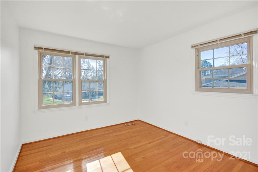 7243 Fox Hunt Road Charlotte, NC 28212 - Photo 8 of 34 a view of an empty room with a window