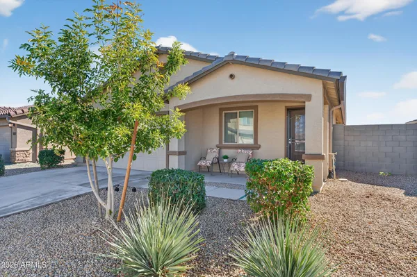 front view of a house with a yard
