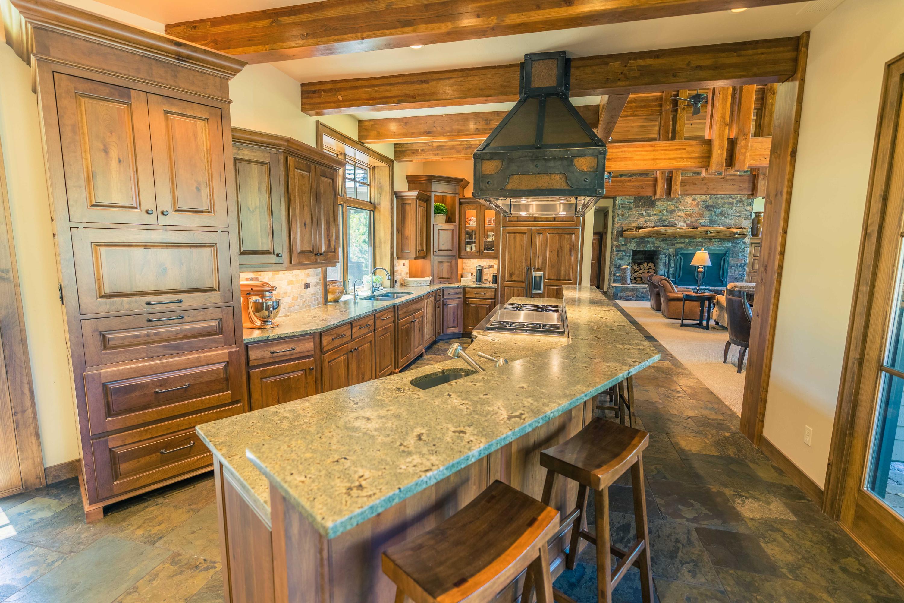 Enjoy the ultimate chef's kitchen, w/mountain views from most windows. Custom BBQ has easy access from kitchen.