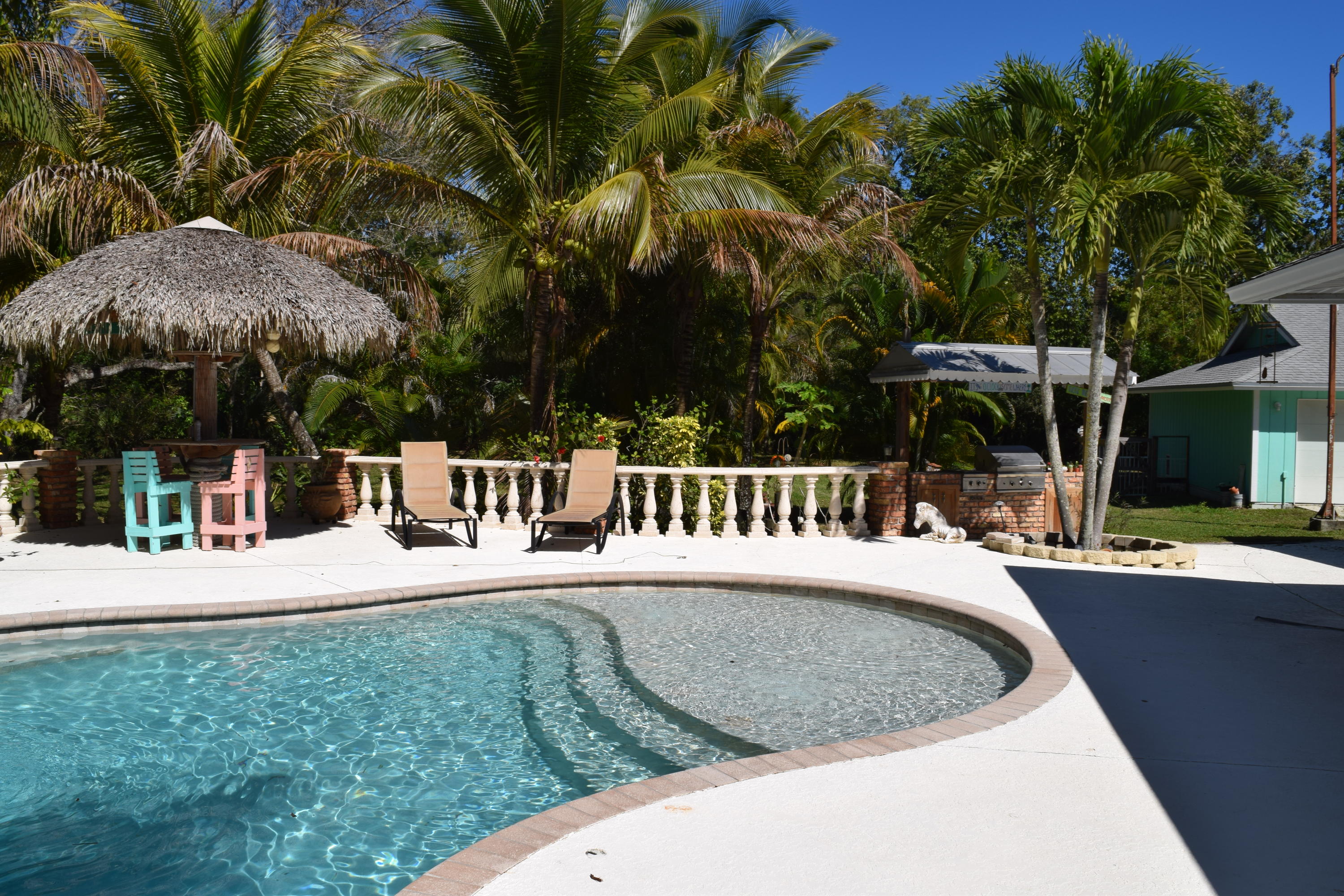 16281 Randolph Siding Road Jupiter, FL 33478 - Photo 28 of 51 pool patio area