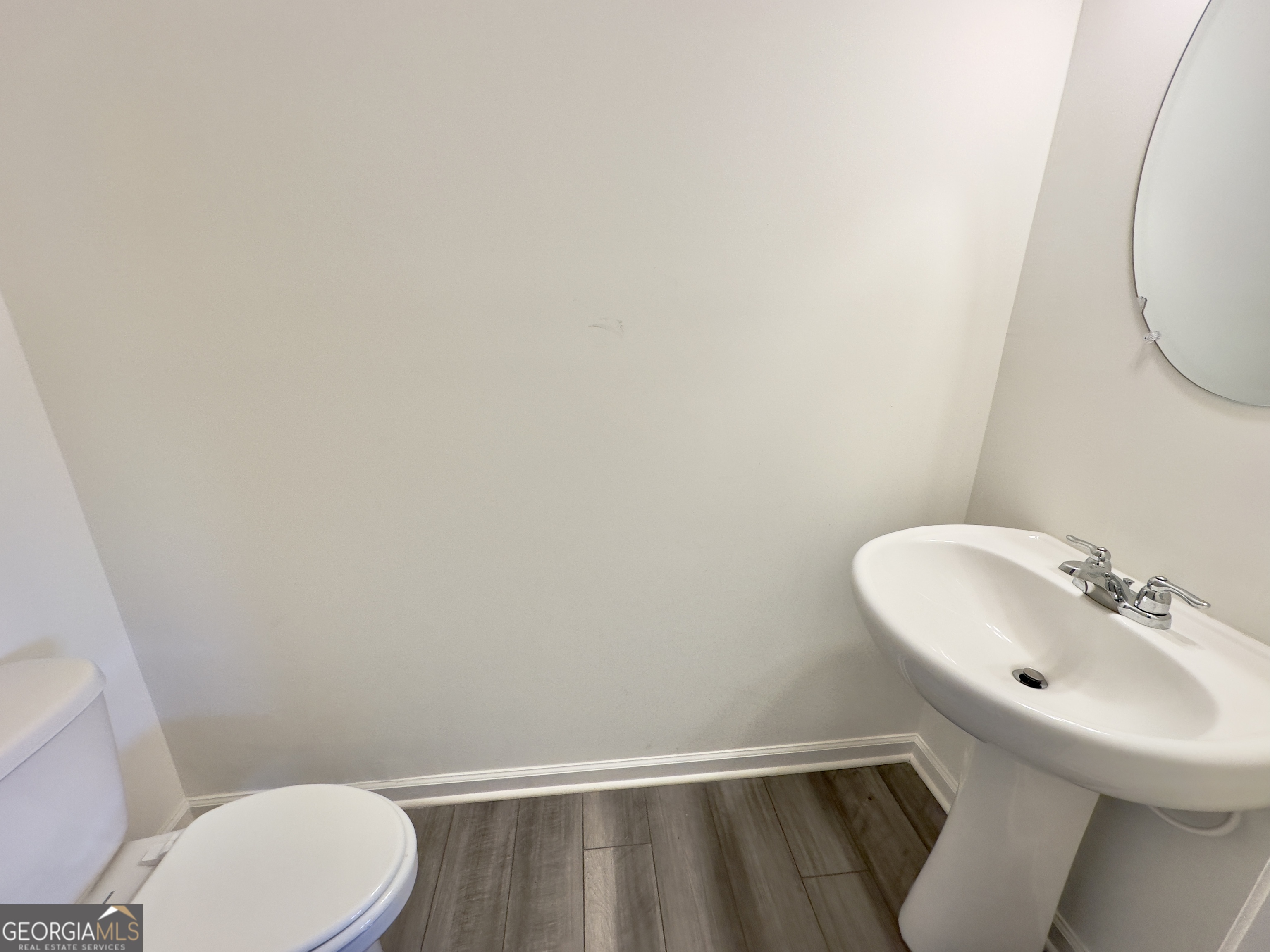 103 Ellicott Way Cartersville, GA 30120 - Photo 11 of 23 a bathroom with a sink and a mirror