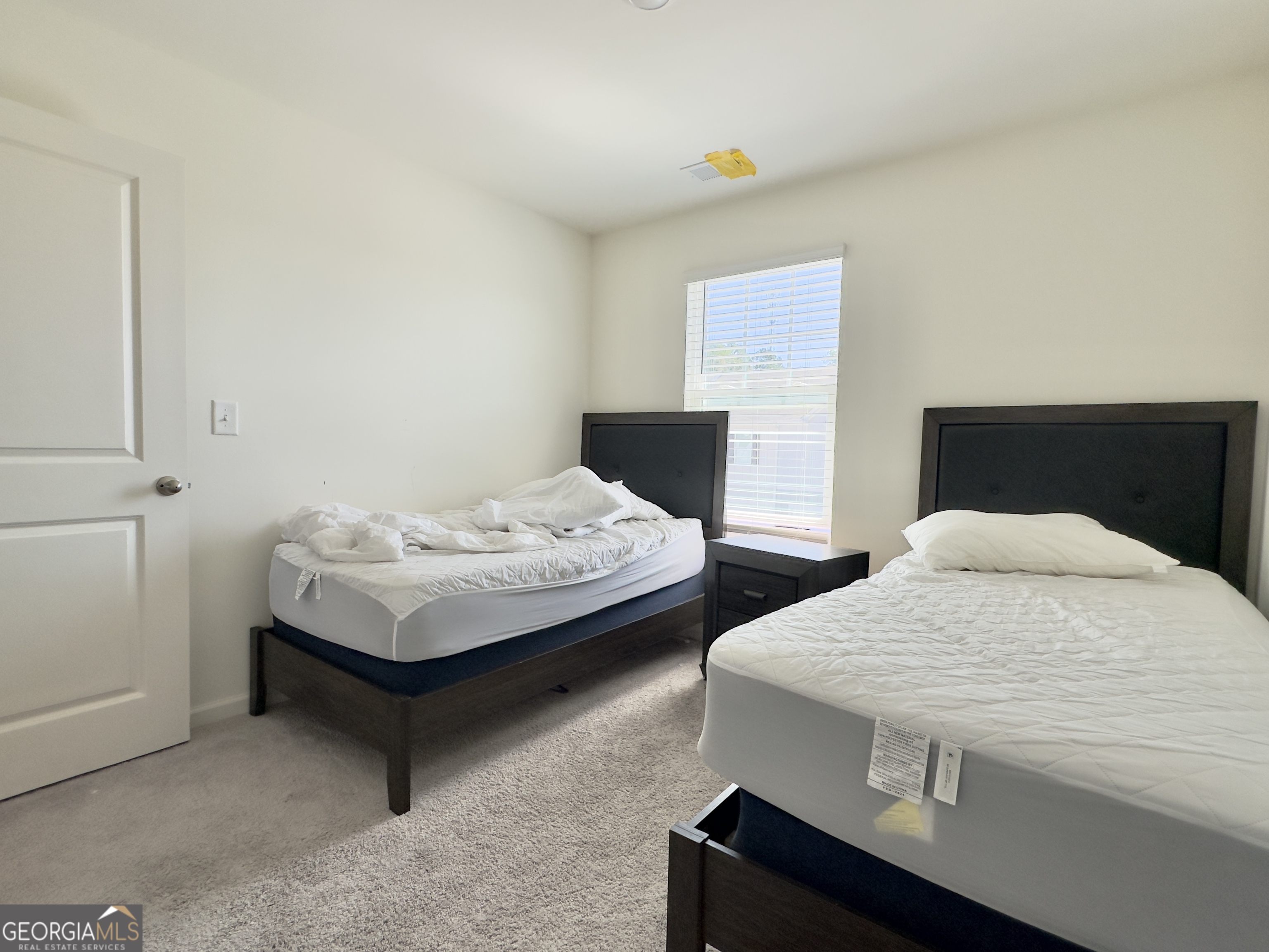 103 Ellicott Way Cartersville, GA 30120 - Photo 18 of 23 a living room with chairs and a table