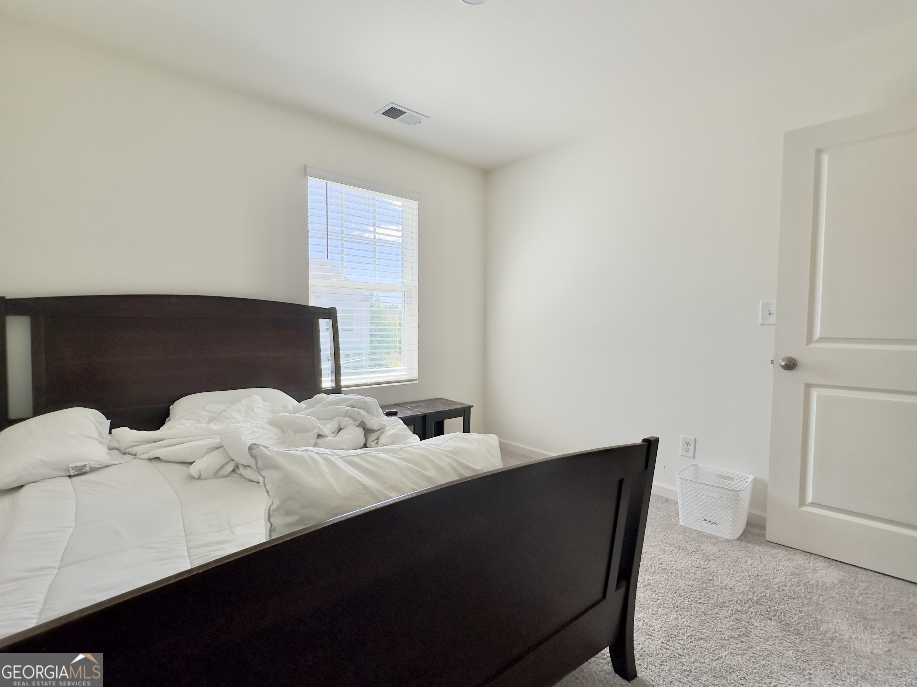 103 Ellicott Way Cartersville, GA 30120 - Photo 20 of 23 a bedroom with a bed and a night stand