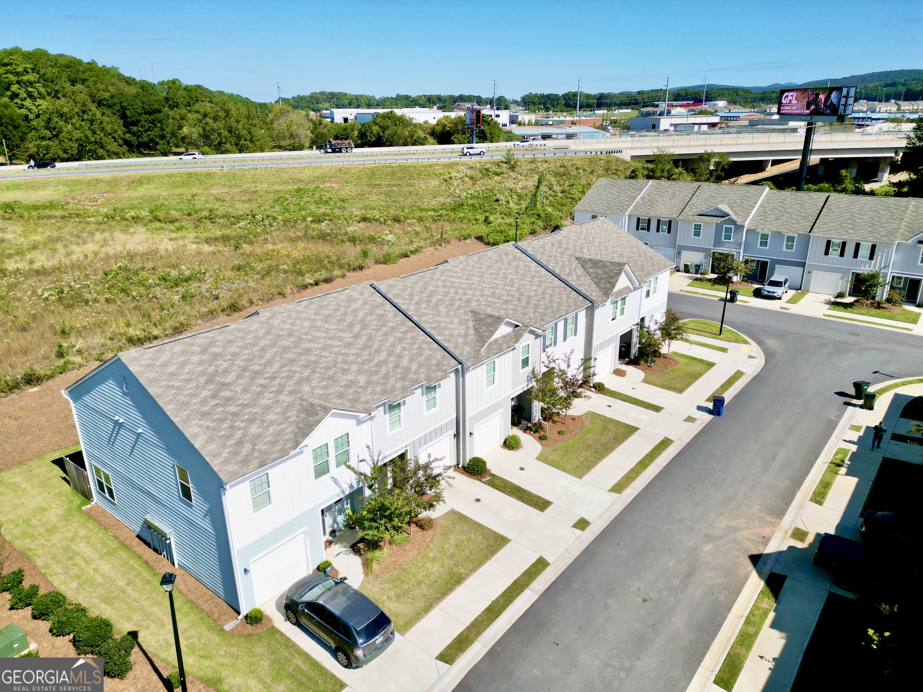 103 Ellicott Way Cartersville, GA 30120 - Photo 3 of 23 an aerial view of residential houses with outdoor space and ocean view
