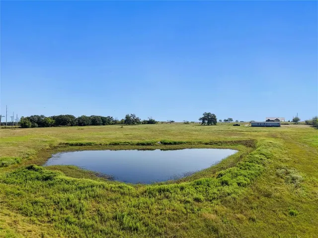 a view of a swimming pool with an ocean view