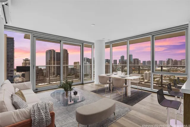 a living room with furniture and a large window