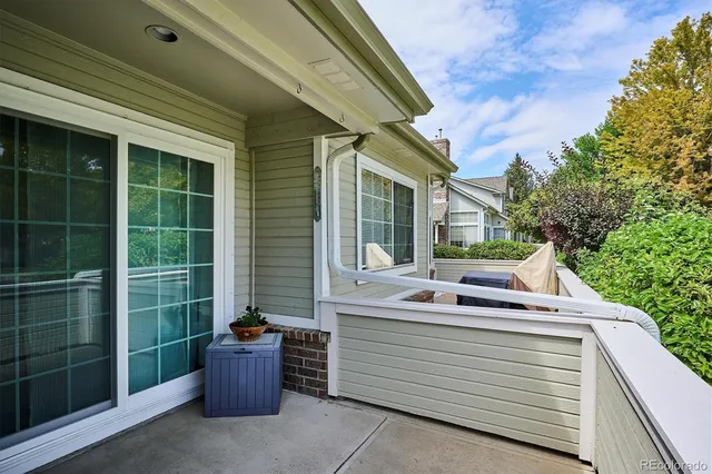 a view of house with backyard