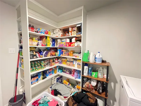 a room with toys and a book shelf