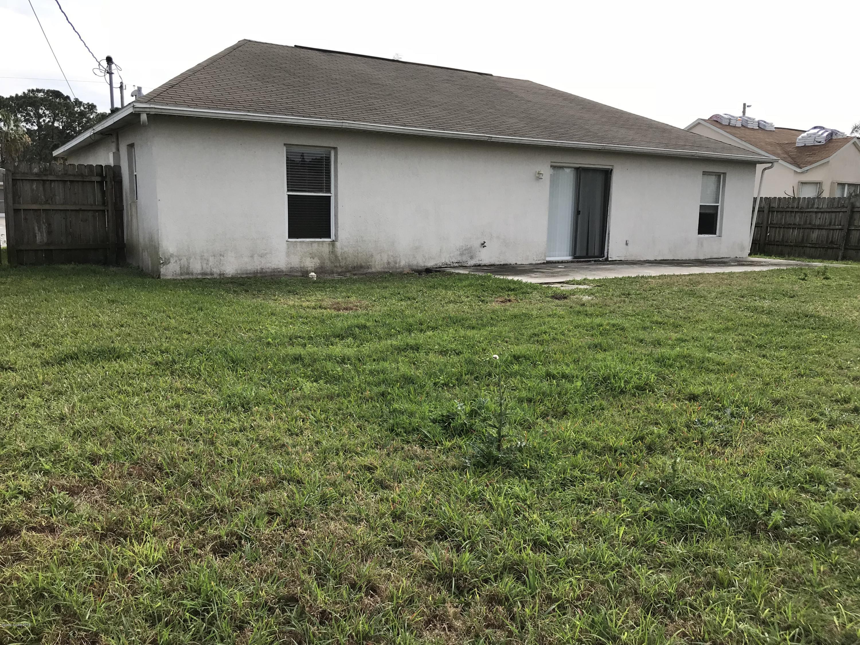 401 Godfrey Road Southeast Palm Bay, FL 32909 - Photo 3 of 22 LIM49k+FTxqGp+dLU4fyJA