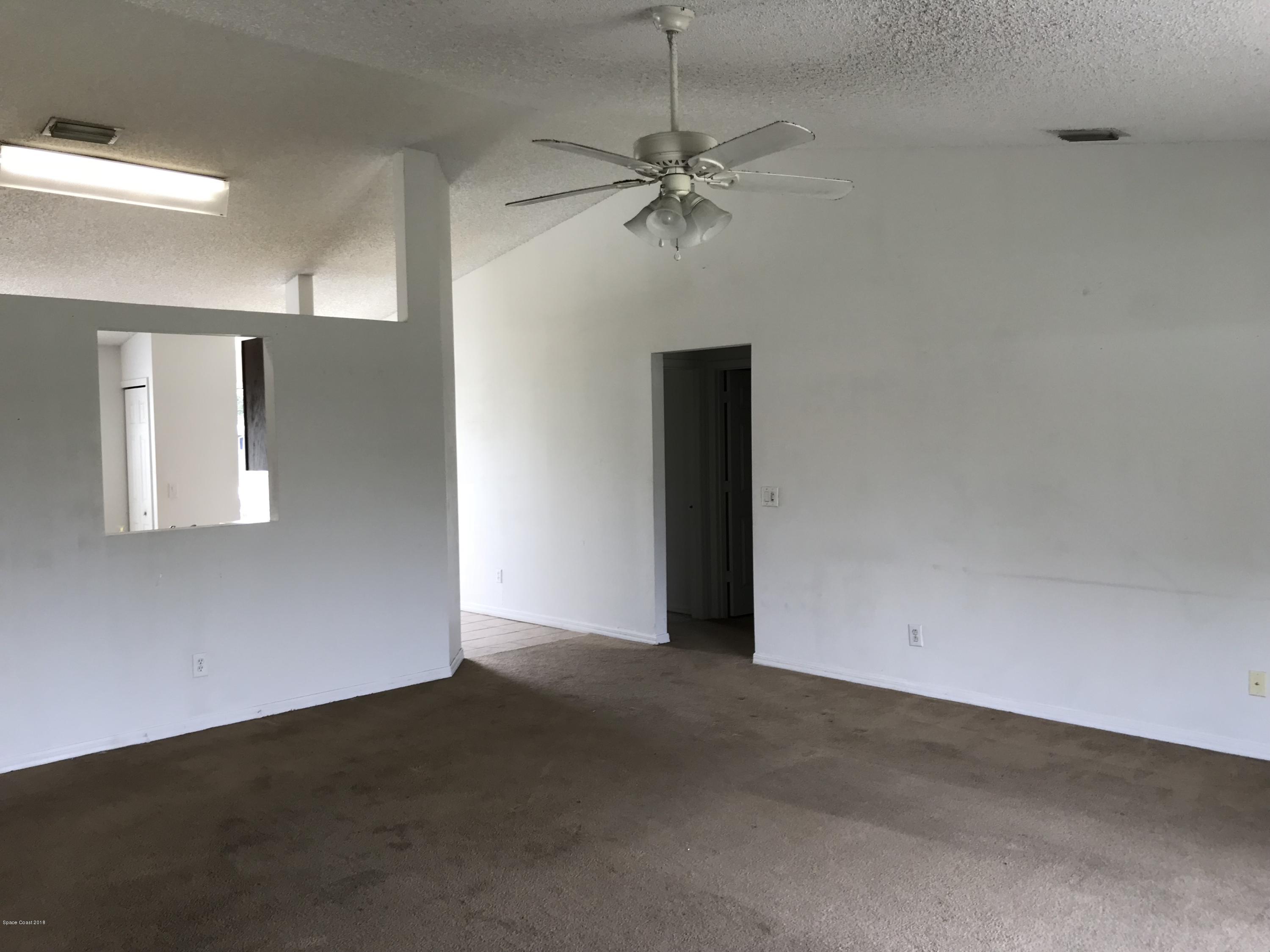 401 Godfrey Road Southeast Palm Bay, FL 32909 - Photo 8 of 22 gJmD+j%kRGesCk8qp5slWA