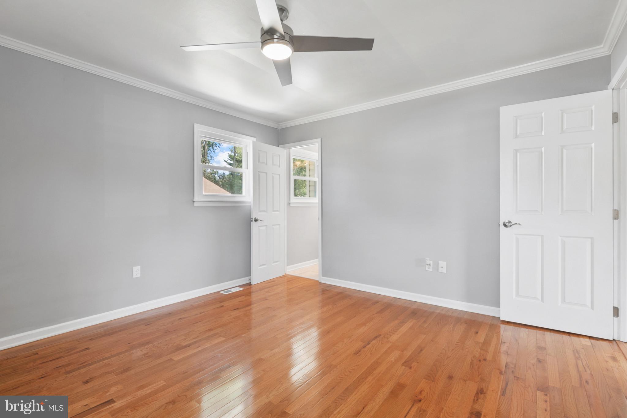 400 Bryanstone Road Owings Mills, MD 21117 - Photo 12 of 35 Primary bedroom has fresh paint and crown molding