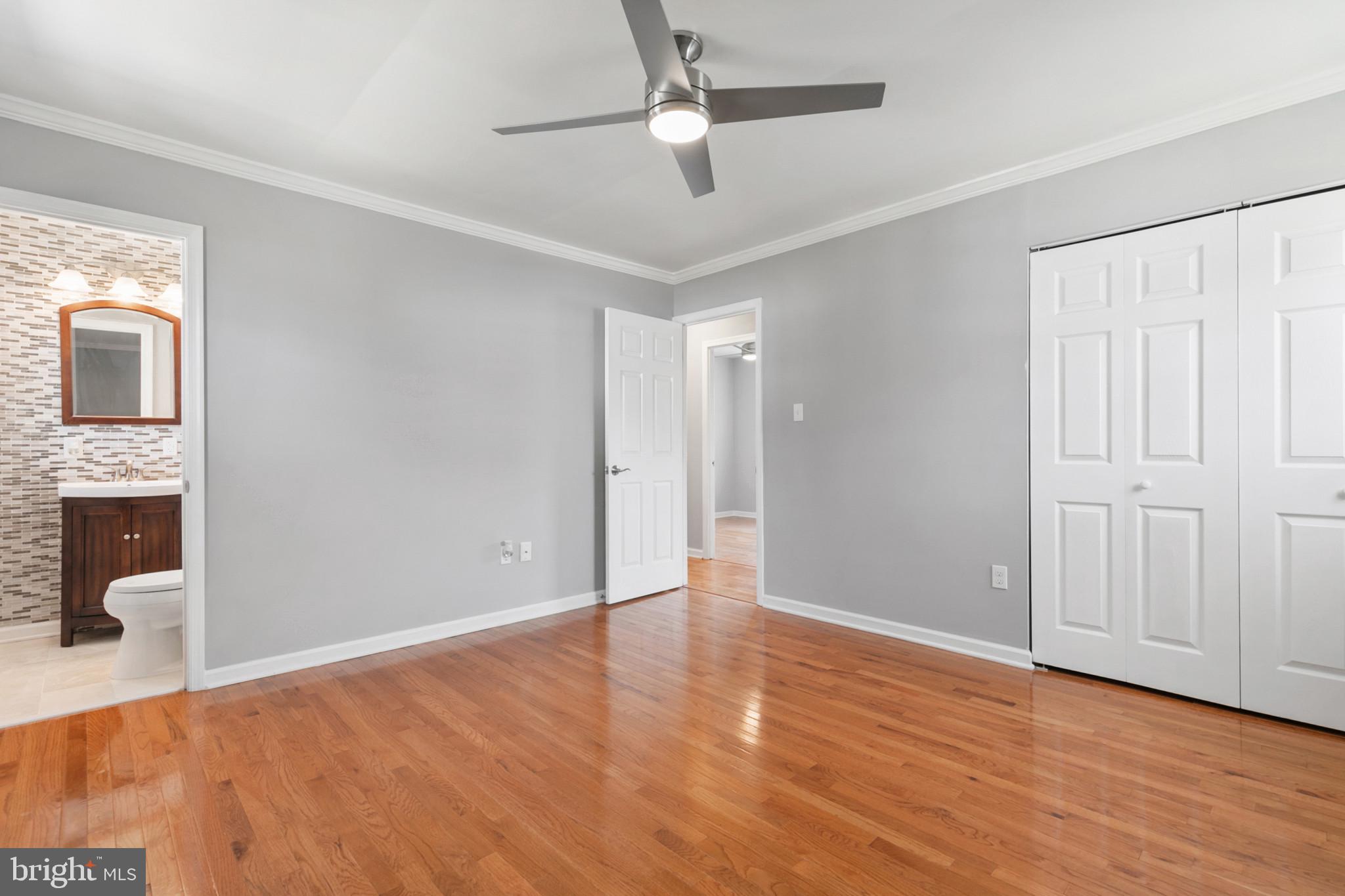 400 Bryanstone Road Owings Mills, MD 21117 - Photo 13 of 35 Primary bedroom has an attached half bath