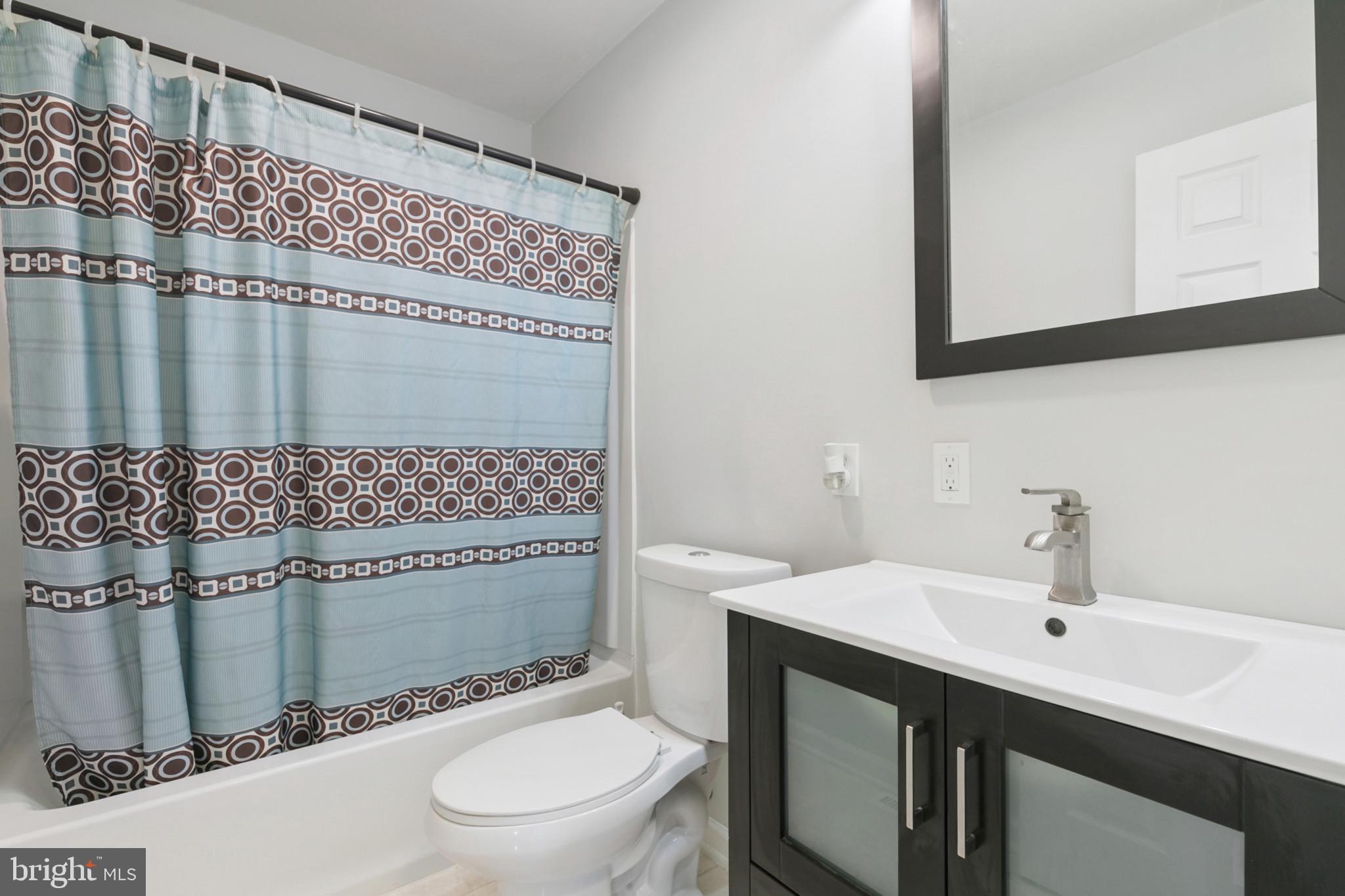 400 Bryanstone Road Owings Mills, MD 21117 - Photo 17 of 35 Full Bath redone in 2024, has ceramic tile floor